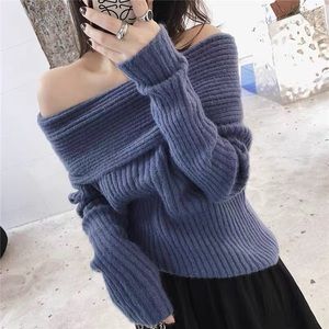Sexy elegant blue sweater with open shoulder